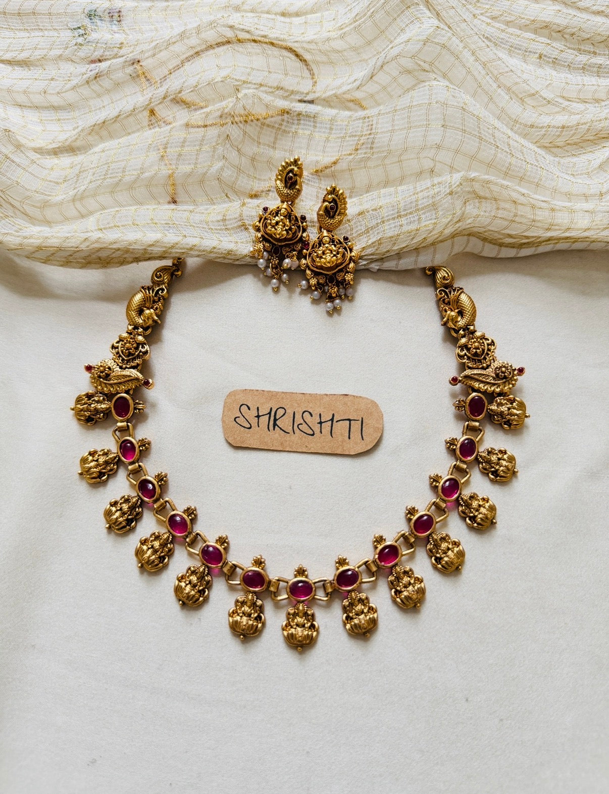 devi charm ruby necklace