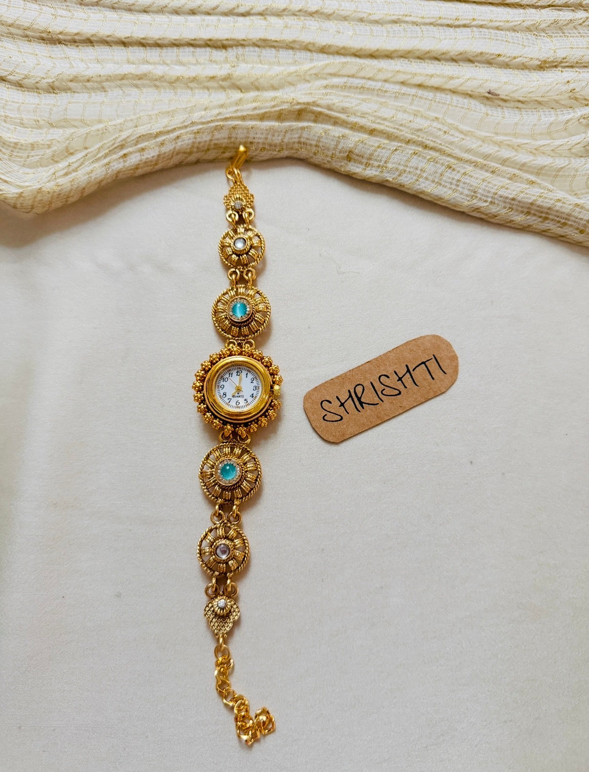 ethnic watch - blue round
