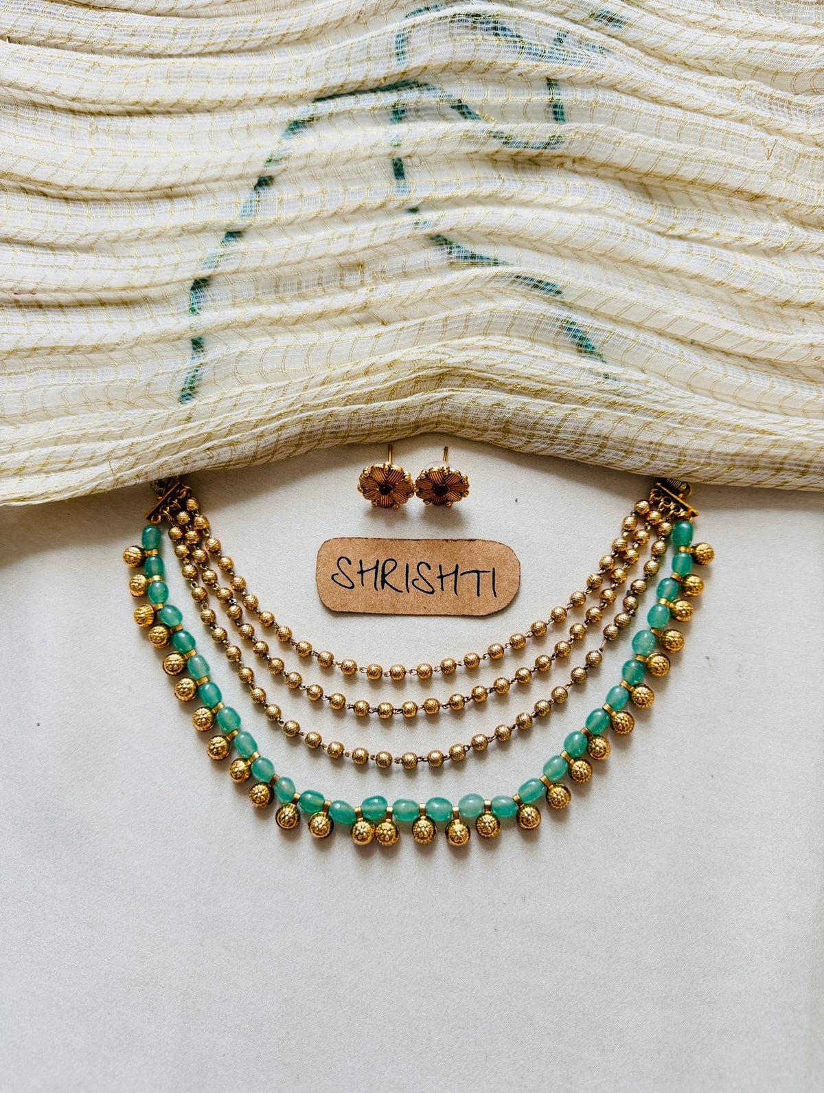 Gold pastel bead layers