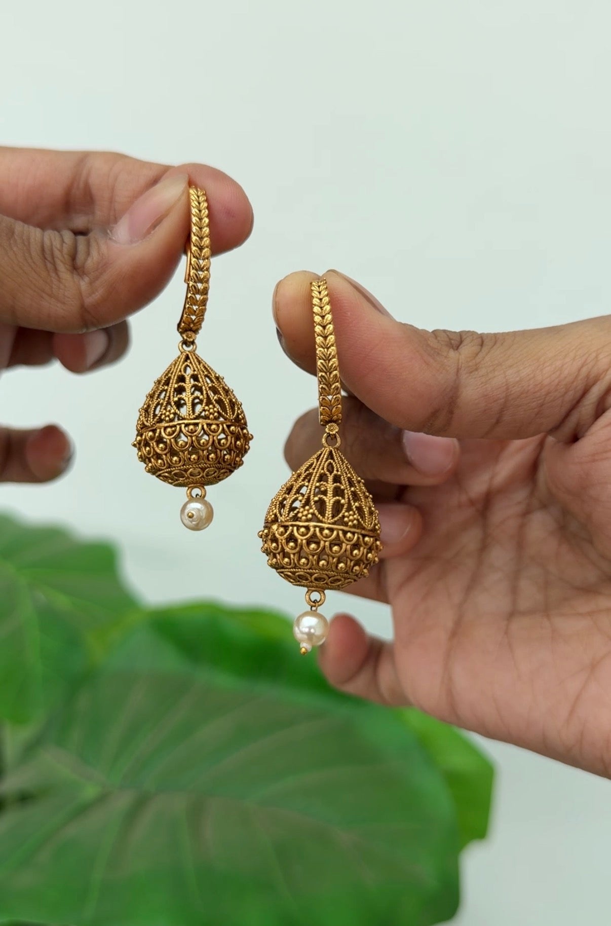 gold hanging earrings