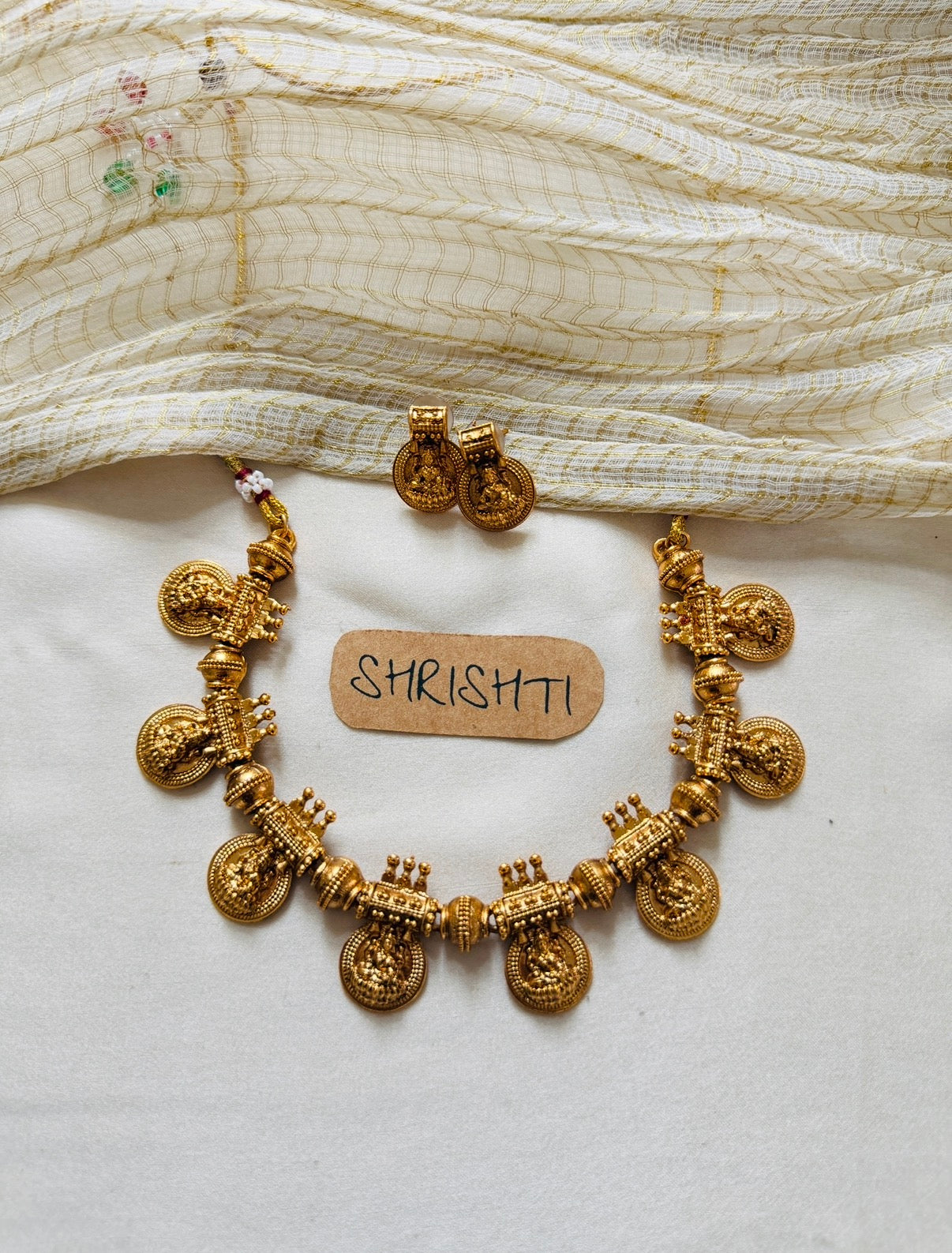 Gold lakshmi coin