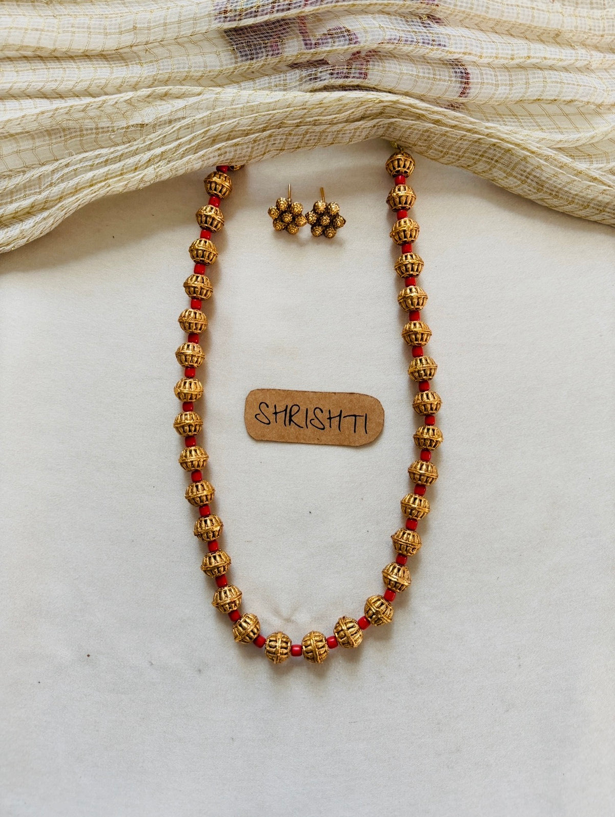 Coral gold bead mala