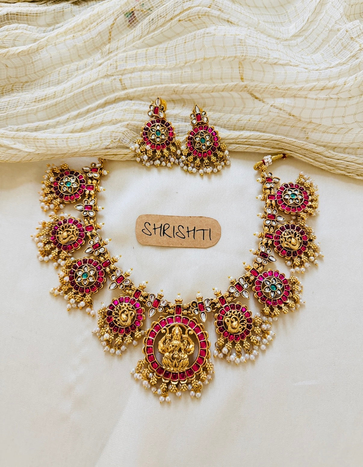 Kemp round pearls ruby