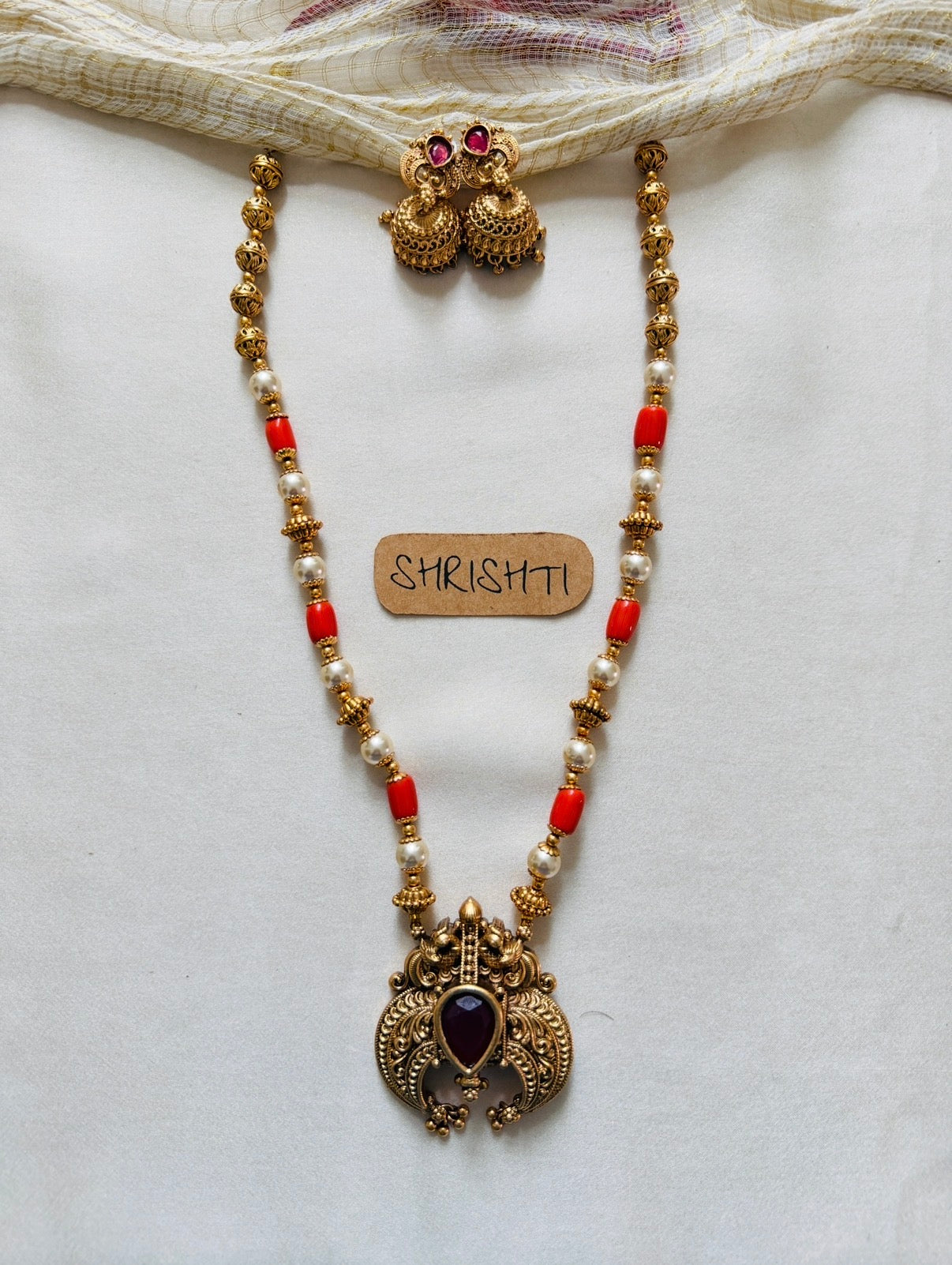 Coral pendant mala ruby