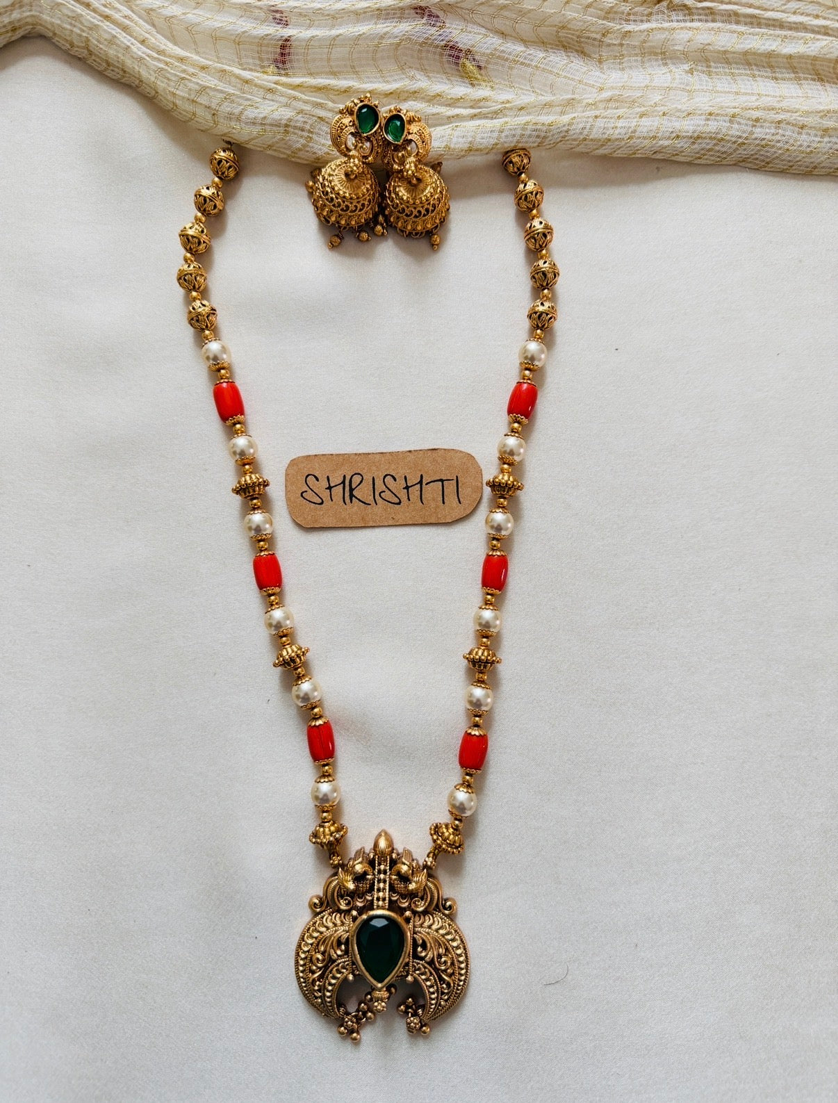 Coral pendant mala green