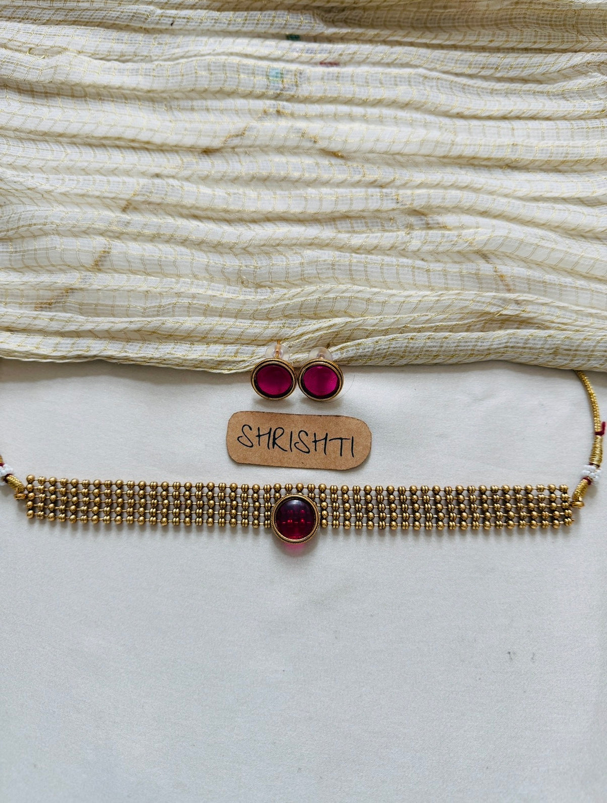 Hema choker gold ruby