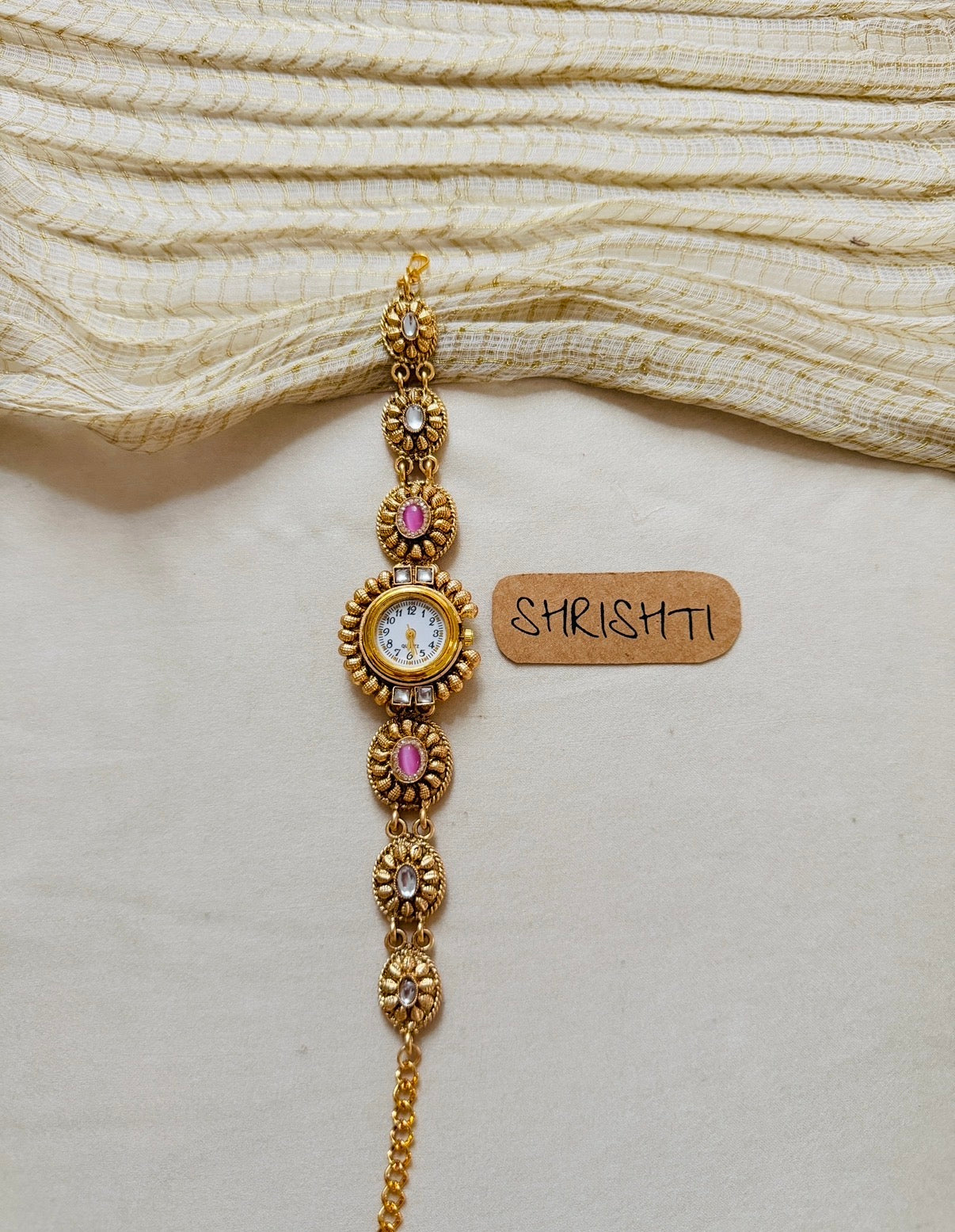ethnic watch - pink oval