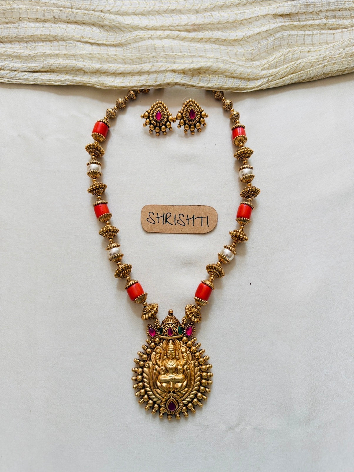 coral lakshmi beads