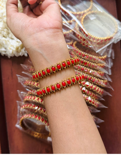 coral bangles 2.6