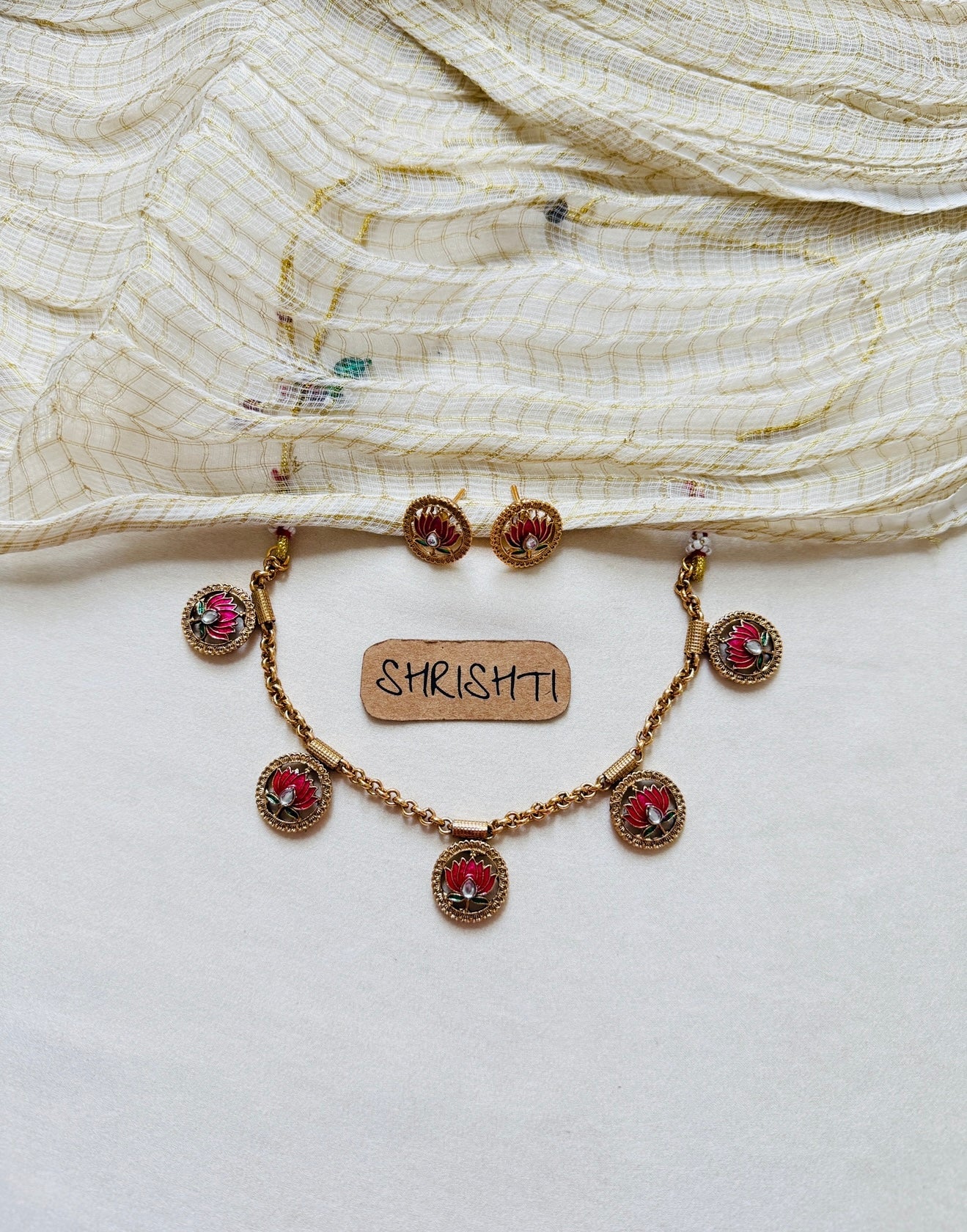 lotus chain charmi ruby